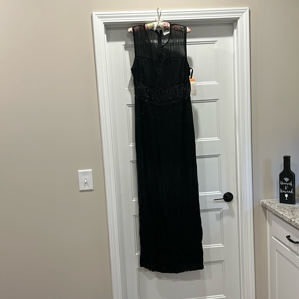 Adriana Papell Illusion Waist Gown with beautiful handmade beading detail.
